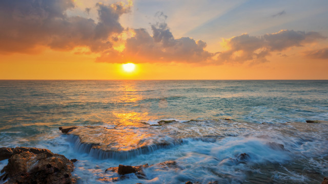 Sunset ocean waves rocks clouds free wallpaper for desktop - medium preview image
