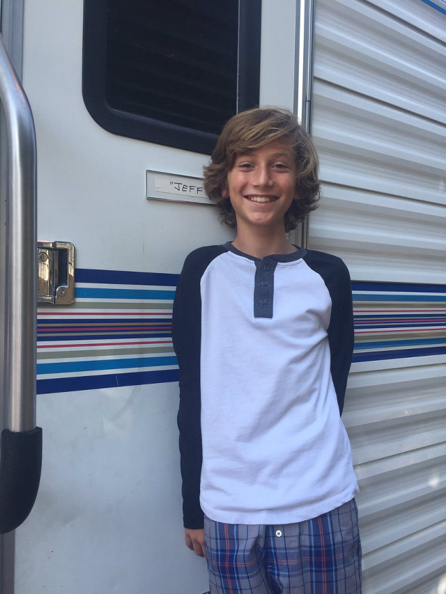 Boy smiling trailer bun plaid free wallpaper for mobile - medium preview image