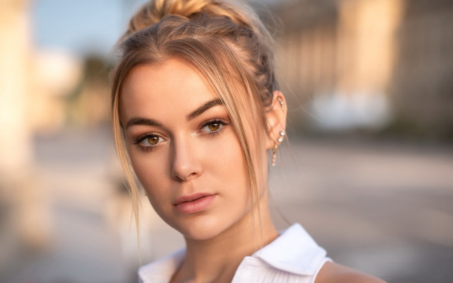 Blonde woman serious look white free wallpaper for desktop - medium preview image