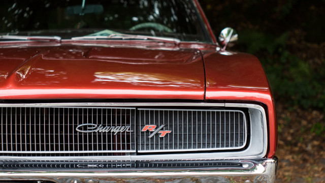 Red car wooded area photorealism free wallpaper for desktop - medium preview image