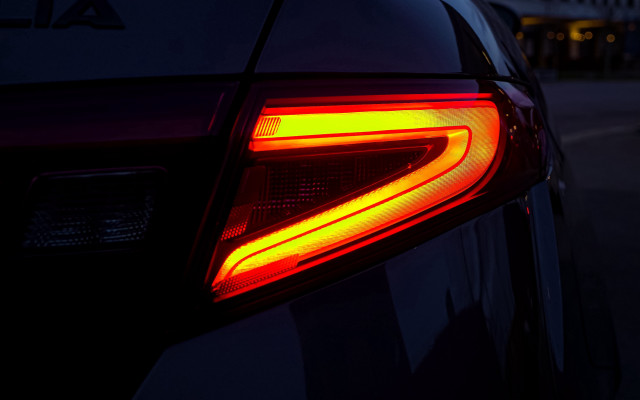 Car tail light night building free wallpaper for desktop - medium preview image