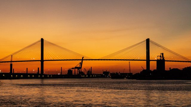 Bridge water sunset boat cityscape free wallpaper for desktop - medium preview image
