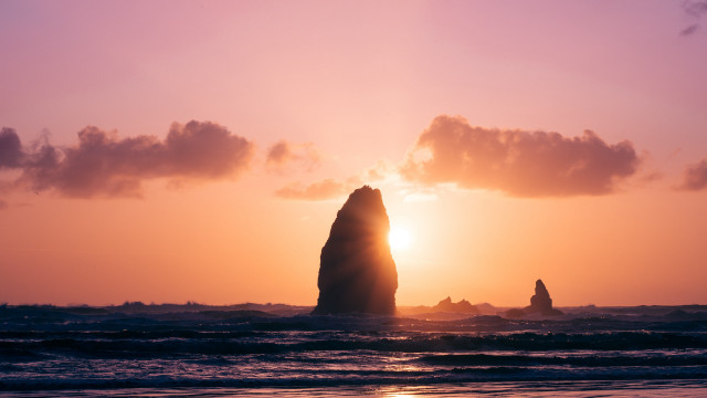 Large rock ocean sunset clouds free wallpaper for desktop - medium preview image