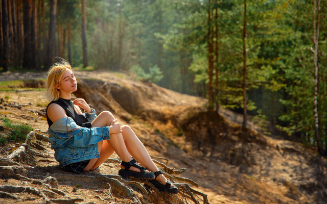 Woman sitting forest blonde blurry free wallpaper for desktop - medium preview image