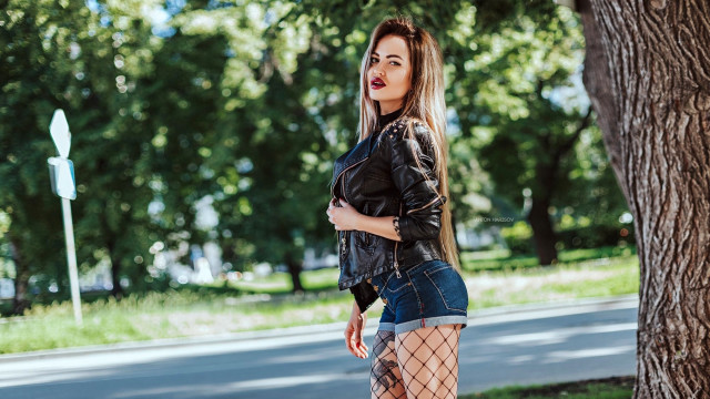 Woman fishnet leather jacket park free wallpaper for desktop - medium preview image