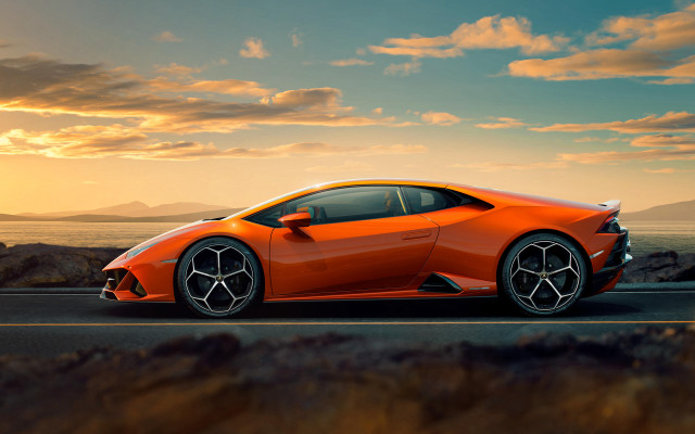 Orange sports car ocean sunset free wallpaper for desktop - medium preview image