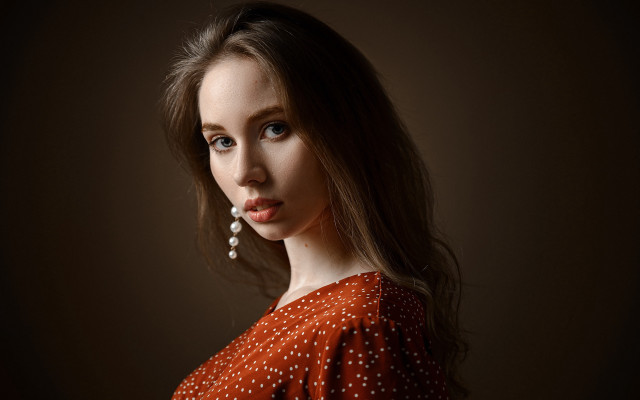 Woman redpolkadotshirt pearlheadband seriousportrait elina free wallpaper for desktop - medium preview image