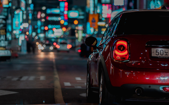 Red car night street tilt free wallpaper for desktop - medium preview image