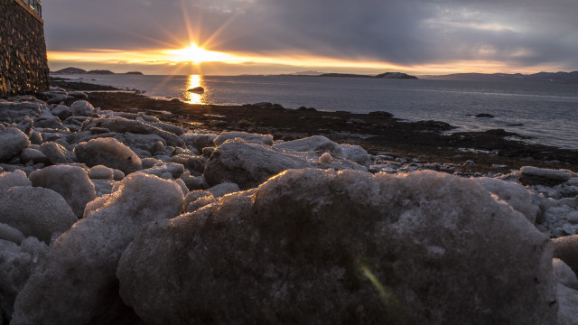 Rock beach sunset island lake free wallpaper for desktop - medium preview image