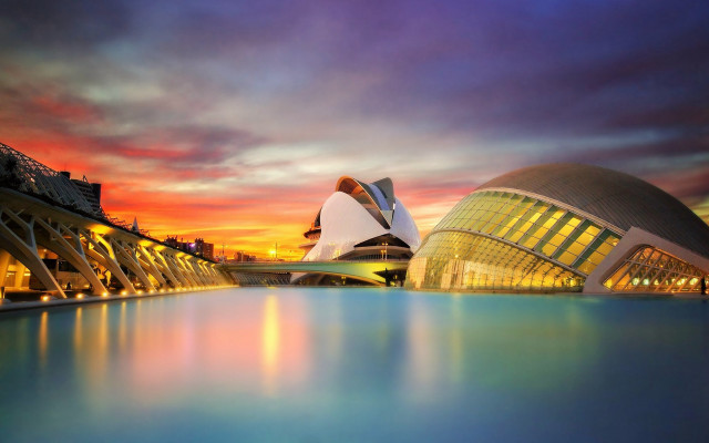 Large building water sunset cityscape free wallpaper for desktop - medium preview image