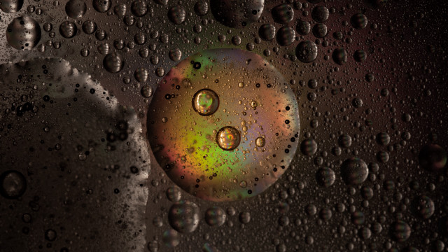 Water droplet macro holography earth free wallpaper for desktop - medium preview image