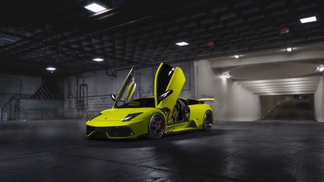 Yellow sports car garage open free wallpaper for desktop - medium preview image