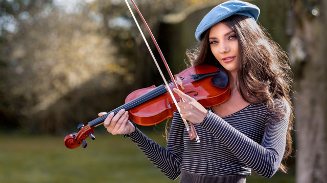 Woman blue hat violin outside free wallpaper for desktop - medium preview image