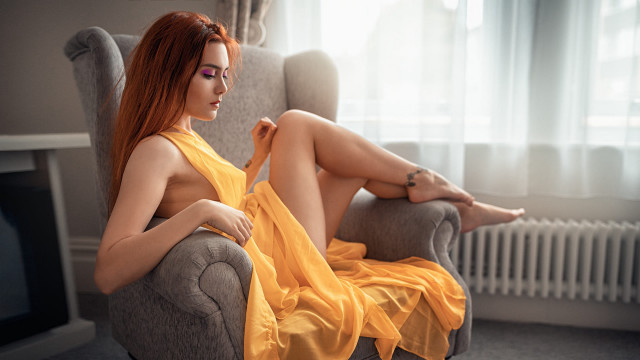 Woman yellow dress sitting chair free wallpaper for desktop - medium preview image