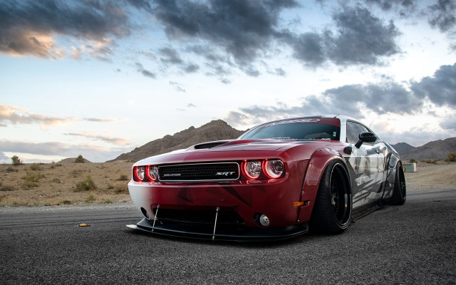 Red sports car cloudy mountains free wallpaper for desktop - medium preview image