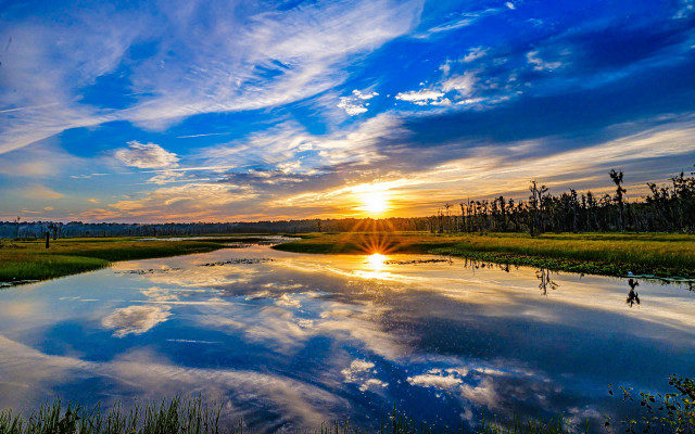 Sunset river clouds shore bridge free wallpaper for desktop - medium preview image