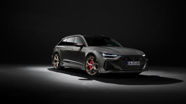 Grey car dark room spotlight free wallpaper for desktop - medium preview image