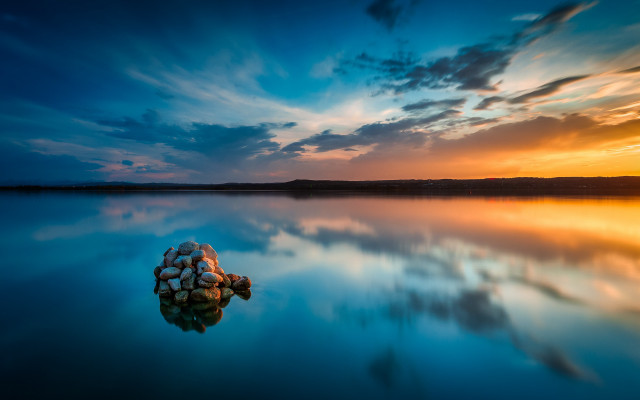 Rock lake sunset clouds portrait free wallpaper for desktop - medium preview image