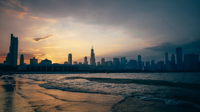 City skyline water sunset clouds free wallpaper for desktop - medium preview image