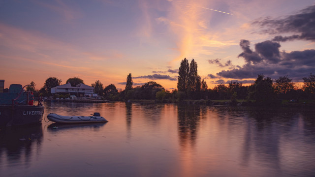 Boat sunset cityscape plane mountain free wallpaper for desktop - medium preview image