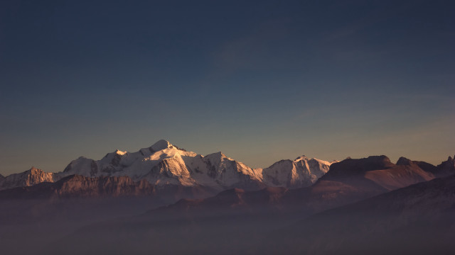 Mountain range snow capped cliffs free wallpaper for desktop - medium preview image