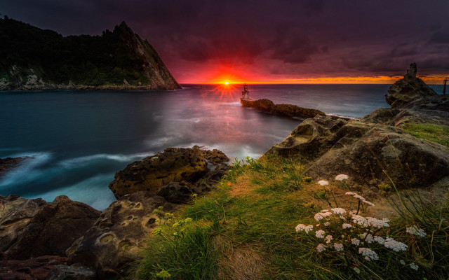 Sunset rocky beach boat mountain free wallpaper for desktop - medium preview image