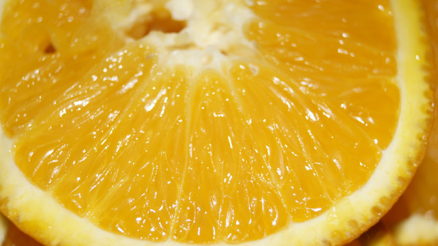 Orange slice water droplets macro free wallpaper for desktop - medium preview image