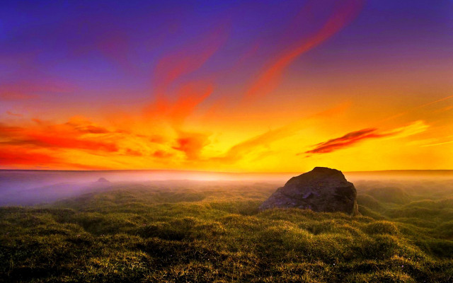 Sunset grassy field rock red #2 free wallpaper for desktop - medium preview image
