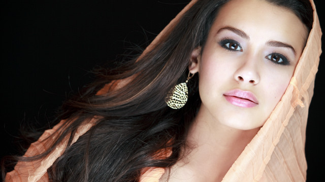 Woman veil longhair earrings blackbackground free wallpaper for desktop - medium preview image