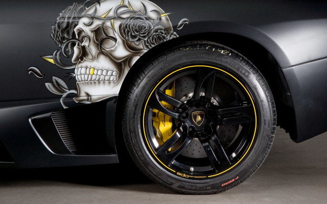Black sportscar skull sidedoor yellow free wallpaper for desktop - medium preview image