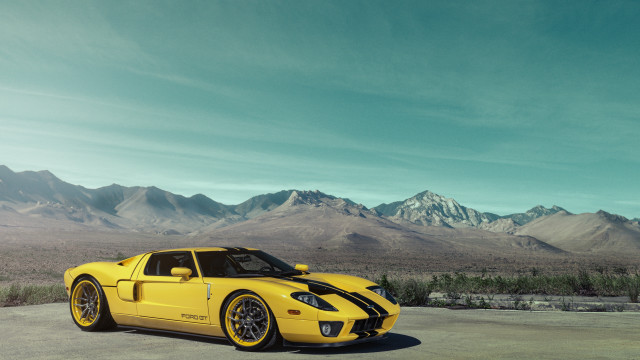 Yellow sports car mountain scape free wallpaper for desktop - medium preview image
