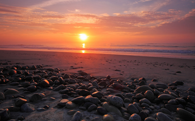 Sunset beach rocks water person free wallpaper for desktop - medium preview image