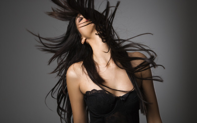 Woman blowing hair black dress #2 free wallpaper for desktop - medium preview image