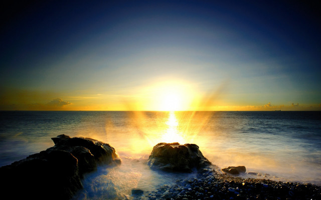 Sunset ocean rocks sky light free wallpaper for desktop - medium preview image