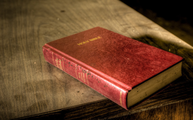 Red book on wooden table free wallpaper for desktop - medium preview image