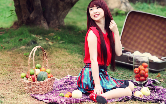 Woman sitting fruit basket outdoors free wallpaper for desktop - medium preview image
