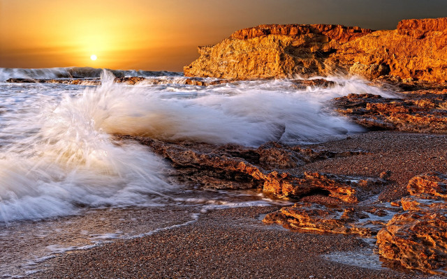 Wave shore sunset rock formation free wallpaper for desktop - medium preview image