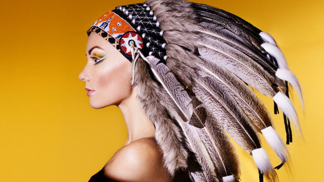 Woman headdress feathers yellow background free wallpaper for desktop - medium preview image