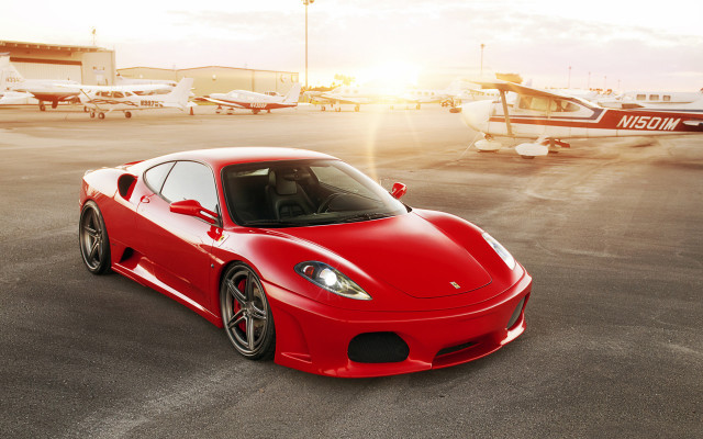 Red sports car parking lot free wallpaper for desktop - medium preview image