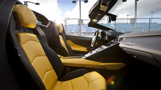 Car yellow black seats sky free wallpaper for desktop - medium preview image