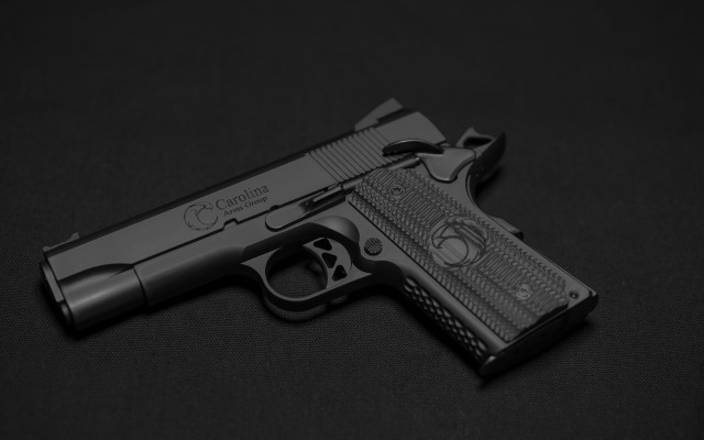 Gun laser engraved black background free wallpaper for desktop - medium preview image