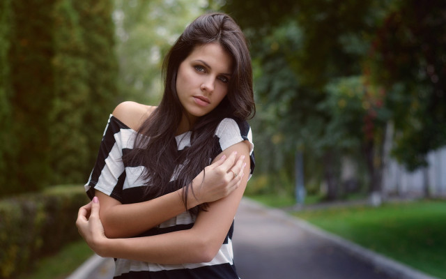 Woman crossed arms outdoors portrait free wallpaper for desktop - medium preview image
