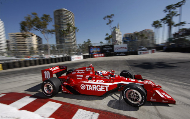 Red race car cityscape tiltshift free wallpaper for desktop - medium preview image