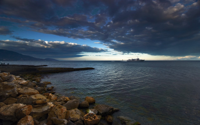 Large water boat cloudy shore free wallpaper for desktop - medium preview image