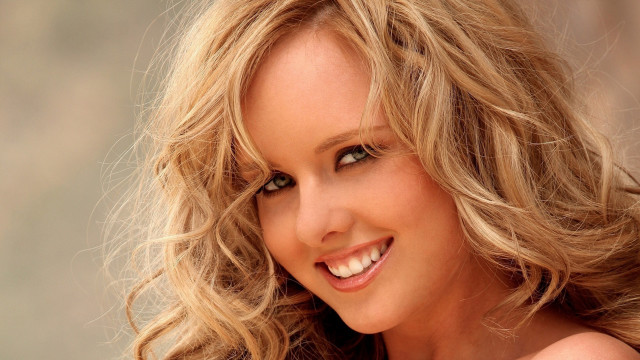 Blonde haired smile wind blown free wallpaper for desktop - medium preview image