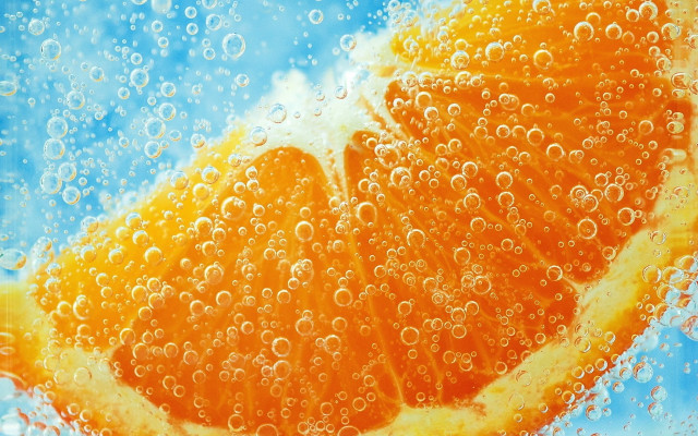 Orange slice bubbles blue sky free wallpaper for desktop - medium preview image