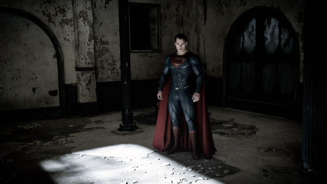 Superman costume shadow dark room free wallpaper for desktop - medium preview image