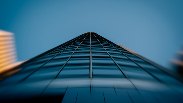 Tall building blue sky clouds free wallpaper for desktop - medium preview image