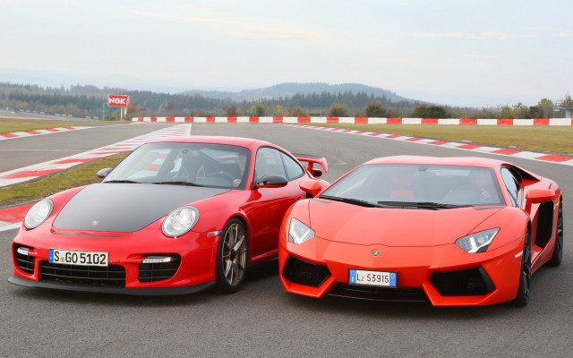 Red sports cars race track free wallpaper for desktop - medium preview image