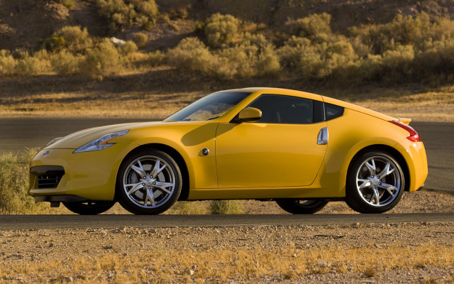 Yellow sports car desert road free wallpaper for desktop - medium preview image